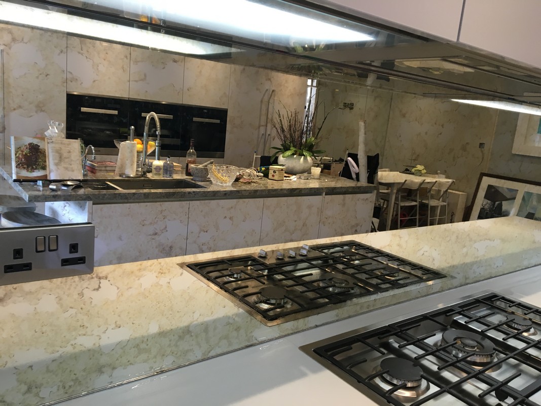 Mirror glass splashback in Ruislip luxury kitchen