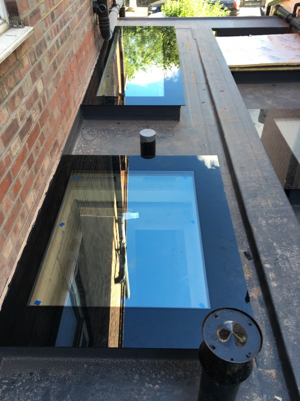 Multiple flat roof skylights on extension in Ruislip